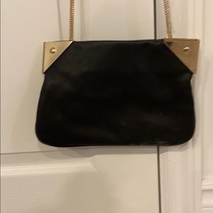 Clutch with cross body chain